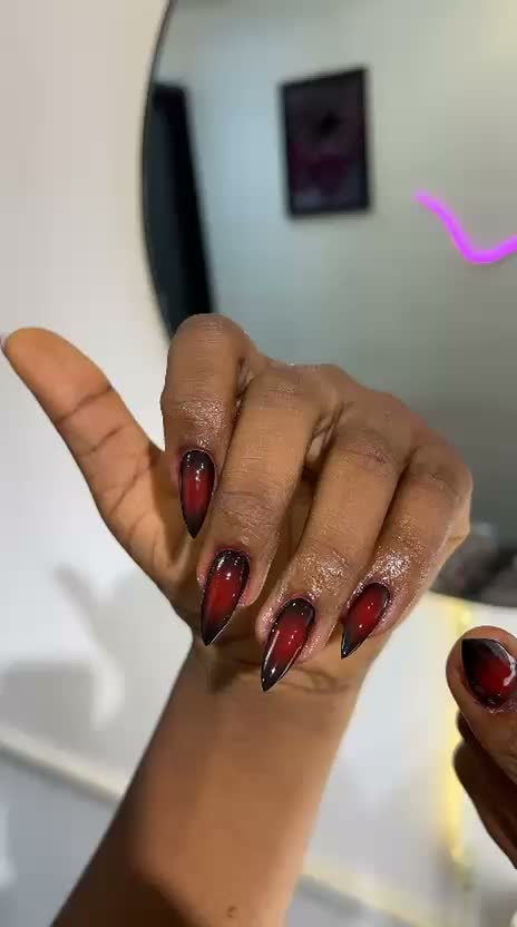 Stiletto nails dark red aura ombre